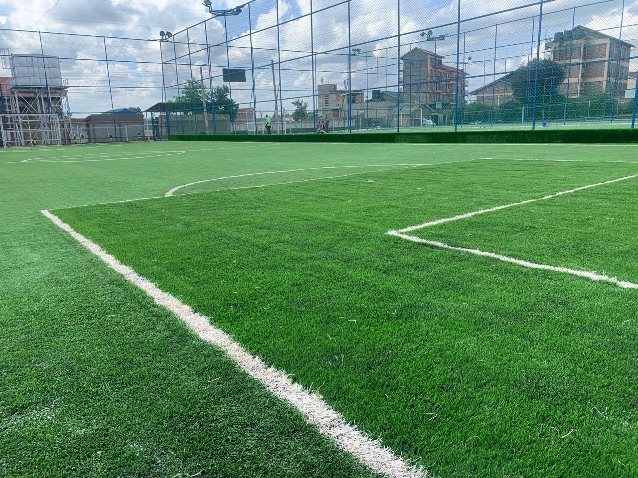 Professional-grade football field where students develop teamwork, strategy, and athletic skills